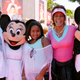 Whitney Houston, Bobby Brown and Bobbi Kristina Brown in 2004 (Lisa Rose/Disney Parks via Getty Images)